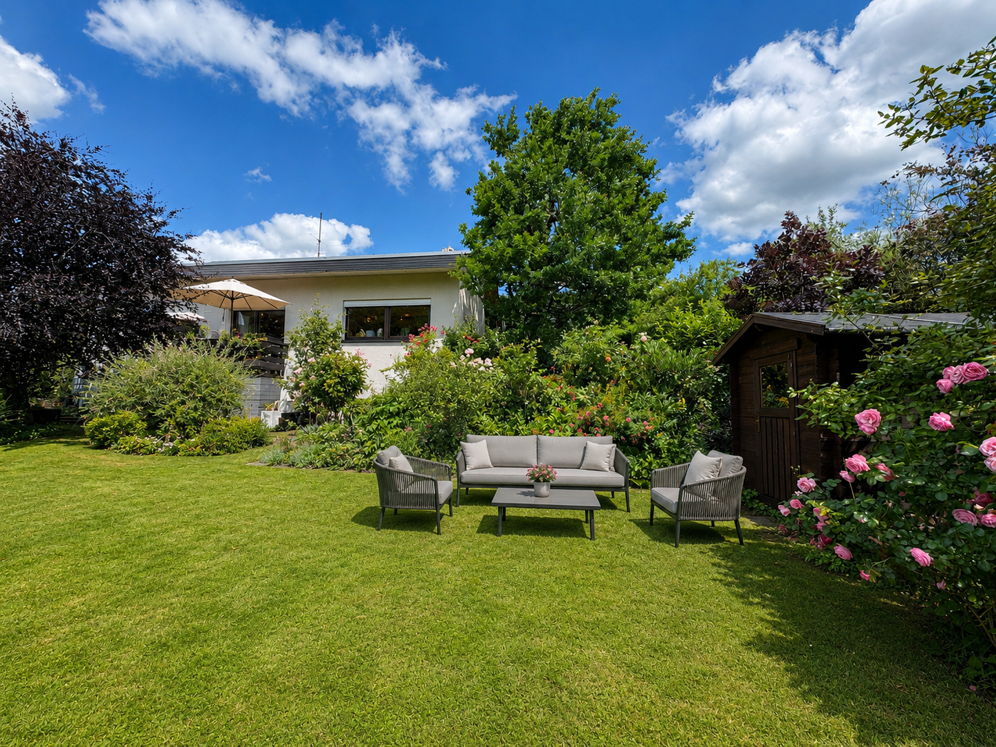 Garten mit Sitzplatz vor dem Haus in Owen